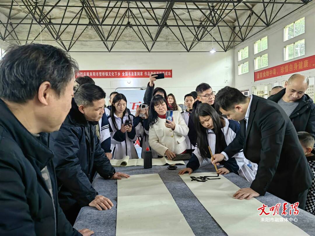 哲桥镇举行“墨香花韵·悦享芳华”庆“三八”文化活动