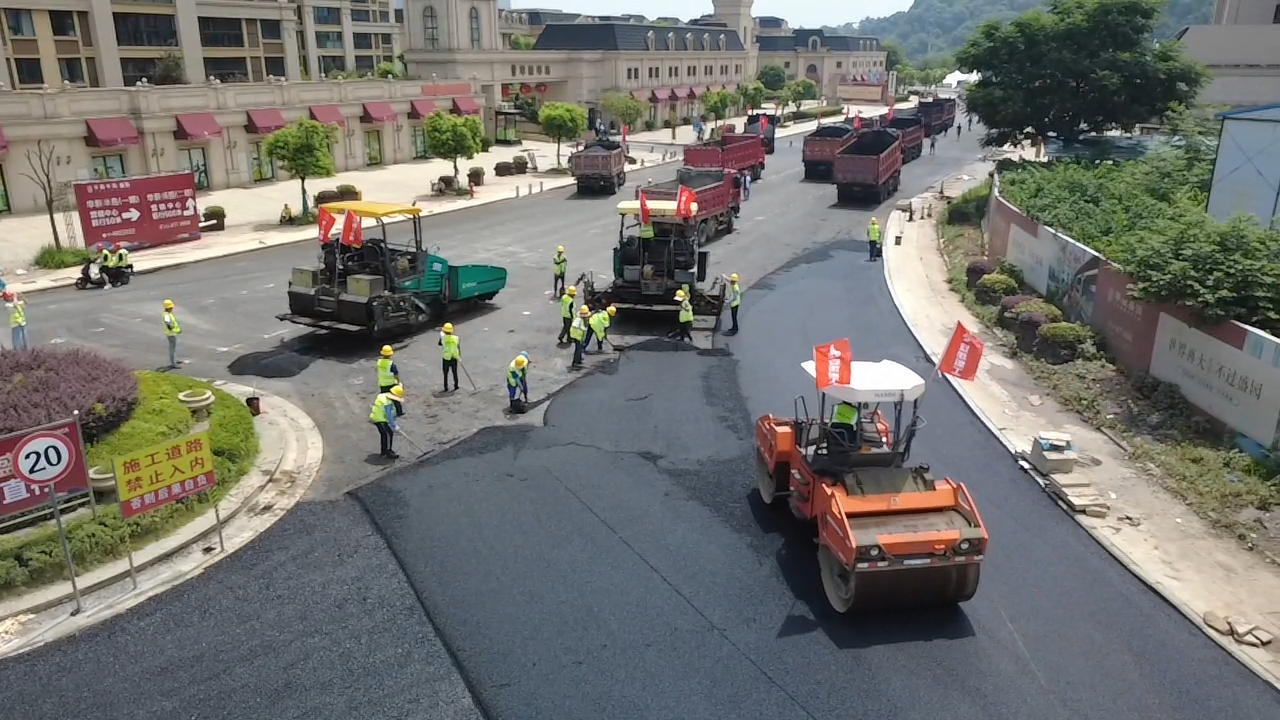 滨江环路启动沥青摊铺  铜锣洲半岛环形路网加速成型
